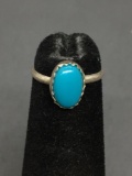 Oval 8x5mm Turquoise Cabochon Center Sterling Silver Ring Band