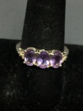 Three Oval Faceted 7x5mm Amethyst Centers Sterling Silver Three-Stone Ring Band