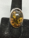 Oval 25mm Long 15mm Wide 14mm Deep Amber Cabochon Center High Polished Sterling Silver Ring Band