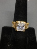 Radiant Faceted 9x7mm CZ Center w/ Twin Radiant Sides & Round CZ Halos Gold-Tone Sterling Silver