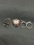 Lot of Three Sterling Silver Charms, One His / Hers Engagement Ring Set, Movie Director's Chair &