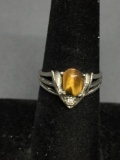 Oval 7x5mm Tiger's Eye Cabochon Center w/ Rhinestone Accent Sterling Silver Ring Band