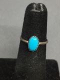 Oval 8x5mm Turquoise Cabochon Center Sterling Silver Ring Band