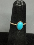 Oval 8x5mm Turquoise Cabochon Center Sterling Silver Ring Band