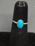 Oval 8x5mm Turquoise Cabochon Center Sterling Silver Ring Band