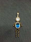 Dancing Boy Themed Gold-Tone Sterling Silver Pendant w/ Oval Faceted 6x4mm Blue Topaz Center & Round