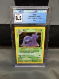 CGC Graded 1999 Pokemon Fossil MUK Holofoil Rare Trading Card - NM-MT+ 8.5