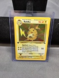 1999 Pokemon Fossil 1st Edition #14 RAICHU Holofoil Rare Trading Card