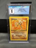 CGC Graded 1999 Pokemon Fossil 1st Edition #22 HITMONLEE Rare Trading Card - NM-MT 8