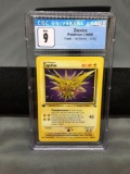 CGC Graded 1999 Pokemon Fossil 1st Edition #30 ZAPDOS Rare Trading Card - MINT 9
