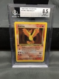 BGS Graded 1999 Pokemon Fossil 1st Edition #12 MOLTRES Holofoil Rare Trading Card - NM-MT+ 8.5