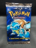 Sealed Pokemon Base Set Unlimited 11 Card Booster Pack - Blastoise Art - 20.6 Grams