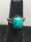 Oval 12x10mm Turquoise Cabochon Center Black Topaz Accented Halo & Shoulders Sterling Silver Ring