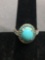 Oval 10x8mm Turquoise Cabochon Center w/ Round Faceted Blue Topaz Halo & Shoulders Sterling Silver