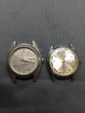 Lot of Two Round 30mm Face Stainless Steel Watches w/o Bracelets, One Evans Designer & One Unknown