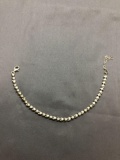 Round Faceted Illusion Set Diamond Accented 4.5mm Wide 7in Long Sterling Silver Tennis Bracelet