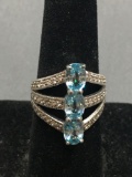 Triple Oval Faceted 7x5mm Blue Topaz Centers w/ Round CZ Accents 22mm Long Sterling Silver Ring Band