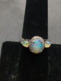 Oval 9x7mm Opal Cabochon Center w/ Twin Teardrop Shaped Opal Sides & Round Faceted CZ Halo Sterling