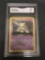 GMA Graded 2000 Pokemon Team Rocket #18 DARK ALAKAZAM Trading Card - NM 7