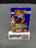 Factory Sealed 1989-90 Fleer Basketball 16 Card Wax Pack - Grading Worthy Michael Jordan?