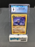 CGC Graded 2000 Pokemon Team Rocket 1st Edition #27 DARK MACHAMP Rare Trading Card - MINT 9