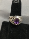 Oval Faceted 7x5mm Amethyst Center Filigree Decorated 14mm Wide Domed Sterling Silver Ring Band