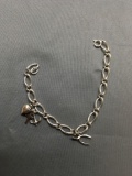 Textured & High Polished Curb Link 6.0mm Wide 7in Long Sterling Silver Bracelet w/ Three Charms