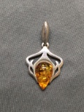 Teardrop Shaped 13x8mm Amber Cabochon Center Filigree Detailed High Polished Signed Designer