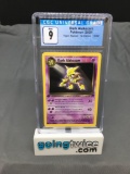 CGC Graded 2000 Pokemon Team Rocket 1st Edition #18 DARK ALAKAZAM Trading Card - MINT 9