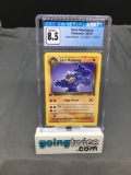 CGC Graded 2000 Pokemon Team Rocket 1st Edition #27 DARK MACHAMP Trading Card - NM-MT+ 8.5