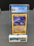 CGC Graded 2000 Pokemon Team Rocket 1st Edition #27 DARK MACHAMP Rare Trading Card - NM-MT+ 8.5