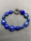 Graduating 10-15mm Oval Fashioned Polished Lapis Gemstone Beaded Detailed Sterling Silver Toggle