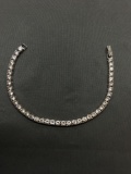 Line of Round Faceted CZ Gems Featured 3.75mm Wide 7in Long Sterling Silver Tennis Bracelet