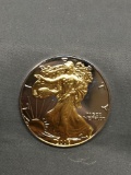AMAZING 2006 United States 1 OZ .999 Fine Silver American Eagle W/ Gold Accents