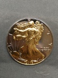 AMAZING 2006 United States 1 OZ .999 Fine Silver American Eagle W/ Gold Accents