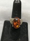 Oval 18x13mm Amber Gemstone Cabochon Center w/ Milgrain Marcasite Detailed Shoulders Sterling Silver