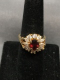Oval Faceted 8x6mm Garnet Center w/ Round & Marquise Faceted CZ Accented Halo Gold-Tone Sterling