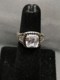Cushion Faceted 8x8mm CZ Center w/ Round Black CZ Accented Halo & Twin Tapered Baguette Sides