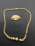 Lot of Two Various Style Carved Bone Jewelry, One Peacock Brooch & One 18in Long Graduating Necklace