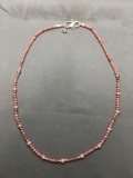 Round Rhodochrosite Beaded 24in Long Station Necklace w/ Sterling Silver Spacers & Decorative