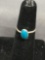 Oval 8x5mm Turquoise Cabochon Center Sterling Silver Ring Band