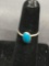 Oval 8x5mm Turquoise Cabochon Center Sterling Silver Ring Band