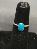 Oval 8x5mm Turquoise Cabochon Center Sterling Silver Ring Band