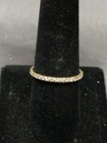 Shared Prong Set Round Faceted CZ Featured 1.75mm Wide Gold-Tone Sterling Silver Eternity Band