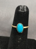 Oval 8x5mm Turquoise Cabochon Center Sterling Silver Ring Band