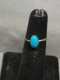 Oval 8x5mm Turquoise Cabochon Center Sterling Silver Ring Band