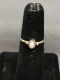 Oval 4.5x3.5mm Sawtooth Set Mother of Pearl Cabochon Center w/ Bead Ball Accent Sterling Silver Ring