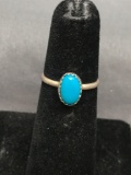 Oval 8x5mm Turquoise Cabochon Center Sterling Silver Ring Band