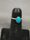 Oval 8x5mm Turquoise Cabochon Center Sterling Silver Ring Band