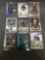9 Card Lot of FOOTBALL ROOKIE CARDS with Stars and Newer Sets - HIGH BOOK VALUE!